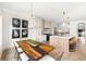 Spacious kitchen with a large island, white cabinets, and stainless steel appliances at 125 Maison Court, Roswell, GA 30076