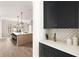 Bright kitchen featuring a large island with counter seating and modern appliances at 125 Maison Court, Roswell, GA 30076
