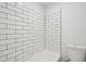 Newly renovated bathroom with white subway tile and updated fixtures at 2079 Wellborn Rd, Lithonia, GA 30058