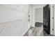 A well-organized storage area with white shelving, seamlessly connected to another room, offering practical storage solutions at 2079 Wellborn Rd, Lithonia, GA 30058