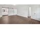 Spacious main bedroom boasts wood floors and an ensuite bathroom with a barn door at 2079 Wellborn Rd, Lithonia, GA 30058