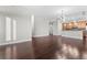 Bright open-concept living space featuring hardwood floors and contemporary light fixtures at 270 17Th Nw St # 4306, Atlanta, GA 30363