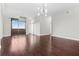 Spacious living room with hardwood floors, modern lighting, and sliding glass doors at 270 17Th Nw St # 4306, Atlanta, GA 30363