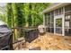 Spacious back deck perfect for outdoor dining and gatherings, featuring stone floors at 3300 Pierce St, College Park, GA 30337