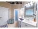 Bright bathroom features double sinks, ample counter space, and separate water closet at 3300 Pierce St, College Park, GA 30337