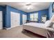Bedroom featuring soft carpeting, two closets, and neutral colored walls at 3300 Pierce St, College Park, GA 30337