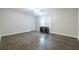 Bonus room with wood floors and a desk area by the window at 3300 Pierce St, College Park, GA 30337