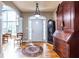 Spacious foyer featuring hardwood floors, a grandfather clock, and decorative rug at 3300 Pierce St, College Park, GA 30337