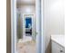 Hallway view featuring a glass shower, bedroom, and vanity at 3300 Pierce St, College Park, GA 30337