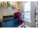 Laundry room with modern washer and dryer, and storage shelves at 3300 Pierce St, College Park, GA 30337