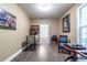 Recreation room with a pinball machine, comfortable seating, and artful décor at 3300 Pierce St, College Park, GA 30337