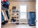 Walk-in closet with metal shelving and storage for shoes, clothes, and accessories with a large safe at 3300 Pierce St, College Park, GA 30337