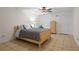 Cozy bedroom featuring a ceiling fan, warm lighting, and tiled floors at 4340 Hadaway Nw Rd, Kennesaw, GA 30152