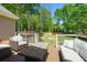 Enjoy the expansive wooden deck, perfect for outdoor gatherings and entertaining with a fire pit at 4340 Hadaway Nw Rd, Kennesaw, GA 30152