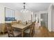 Dining room with decorative lighting and a light neutral color scheme at 4340 Hadaway Nw Rd, Kennesaw, GA 30152