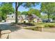 Beautiful home exterior with a landscaped front yard, brick driveway and welcoming curb appeal at 4340 Hadaway Nw Rd, Kennesaw, GA 30152