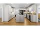 Updated kitchen featuring white cabinets, stainless steel appliances, and hardwood flooring at 4340 Hadaway Nw Rd, Kennesaw, GA 30152
