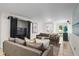 Comfortable living room featuring plush sofas, neutral decor, and ample natural light at 4340 Hadaway Nw Rd, Kennesaw, GA 30152