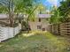 Home featuring a green backyard with a mix of wooden privacy fences and plenty of shade at 1355 E Rock Springs Ne Rd, Atlanta, GA 30306
