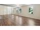 Bright bedroom with hardwood floors, ample natural light, and mirrored closet doors at 1355 E Rock Springs Ne Rd, Atlanta, GA 30306