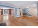 Large living room with hardwood floors and access to other rooms at 1355 E Rock Springs Ne Rd, Atlanta, GA 30306