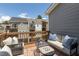 Balcony overlooking neighboring townhomes features a comfortable seating arrangement and small glass table at 1995 Bryant Park Ln, Decatur, GA 30033