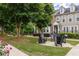Inviting community space with Adirondack chairs and lush landscaping creating a welcoming atmosphere at 1995 Bryant Park Ln, Decatur, GA 30033