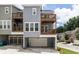 Charming townhome with multiple decks and attached garages in a residential neighborhood at 1995 Bryant Park Ln, Decatur, GA 30033