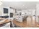 Open-concept kitchen featuring a large island, stainless steel appliances, and hardwood floors at 1995 Bryant Park Ln, Decatur, GA 30033