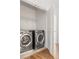 Convenient laundry room with stainless steel washer and dryer at 1995 Bryant Park Ln, Decatur, GA 30033