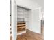 Walk-in pantry with shelving, drawers, dark counter and decorative glass french doors at 1995 Bryant Park Ln, Decatur, GA 30033