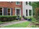 Inviting front entrance with decorative planters and trimmed hedges at 2206 Heritage Trace Dr, Marietta, GA 30062
