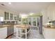 Spacious kitchen with butcher block counters, mosaic backsplash, stainless steel appliances, and view to backyard at 2206 Heritage Trace Dr, Marietta, GA 30062