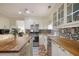 Bright kitchen featuring butcher block counters, stainless steel appliances, mosaic backsplash, and light cabinets at 2206 Heritage Trace Dr, Marietta, GA 30062