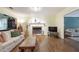 Spacious living room with a fireplace and wood flooring at 2206 Heritage Trace Dr, Marietta, GA 30062