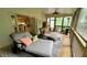 Relaxing screened porch with wood floors and comfortable chaise lounges at 2206 Heritage Trace Dr, Marietta, GA 30062