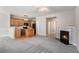 Open-concept design: living room seamlessly blends with the kitchen creating an inviting space at 2731 Pierce Brennen Ct, Lawrenceville, GA 30043