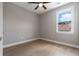Empty bedroom featuring hardwood flooring and a large window at 671 Brennan Dr, Decatur, GA 30033