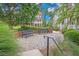 Inviting outdoor seating area with benches, brick walls, and manicured landscaping at 671 Brennan Dr, Decatur, GA 30033