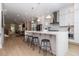 Bright and airy kitchen featuring a large island, stainless steel appliances, and modern finishes at 671 Brennan Dr, Decatur, GA 30033
