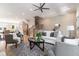 Bright living room featuring neutral colors, a ceiling fan, and hardwood floors at 671 Brennan Dr, Decatur, GA 30033