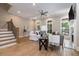 Bright living room featuring neutral colors, a ceiling fan, and hardwood floors at 671 Brennan Dr, Decatur, GA 30033