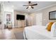 Spacious main bedroom with walk-in closet, ceiling fan and ample natural light at 671 Brennan Dr, Decatur, GA 30033