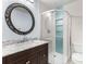 Elegant bathroom featuring a glass-enclosed shower, marble vanity top, and decorative mirror at 1101 Collier Nw Rd # P2, Atlanta, GA 30318