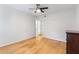 Spacious bedroom featuring hardwood floors, ceiling fan, and ample natural light at 1101 Collier Nw Rd # P2, Atlanta, GA 30318