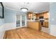 Eat-in kitchen features a view of the backyard from the French doors and a kitchen island at 1101 Collier Nw Rd # P2, Atlanta, GA 30318