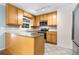 This kitchen has granite countertops and stainless steel appliances at 1101 Collier Nw Rd # P2, Atlanta, GA 30318