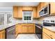 Bright kitchen with stainless steel appliances and granite counters at 1101 Collier Nw Rd # P2, Atlanta, GA 30318