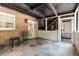 Cozy brick patio with seating area, stone floors and outside access to an exterior staircase at 1101 Collier Nw Rd # P2, Atlanta, GA 30318