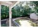 Balcony view featuring beautiful landscaping, lots of trees, walking path and nature at 1150 Collier Rd # K3, Atlanta, GA 30318